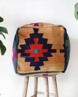 Floor pouf in a living room setting, pillow, turkish pillow, kilim pillow, home decor, decorative pillow, sham, rug pillow, decor, home decor, pouf, floor cushion, cushion, Portland, rugshop, Oregon, Wild Shaman, ottoman