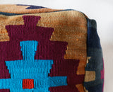 Floor pouf in a living room setting, pillow, turkish pillow, kilim pillow, home decor, decorative pillow, sham, rug pillow, decor, home decor, pouf, floor cushion, cushion, Portland, rugshop, Oregon, Wild Shaman, ottoman
