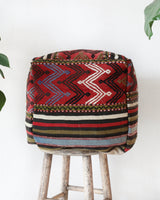 Floor pouf in a living room setting, pillow, turkish pillow, kilim pillow, home decor, decorative pillow, sham, rug pillow, decor, home decor, pouf, floor cushion, cushion, Portland, rugshop, Oregon, Wild Shaman, ottoman