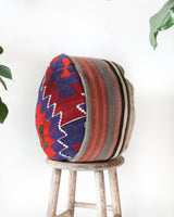 Floor pouf in a living room setting, pillow, turkish pillow, kilim pillow, home decor, decorative pillow, sham, rug pillow, decor, home decor, pouf, floor cushion, cushion, Portland, rugshop, Oregon, Wild Shaman, ottoman