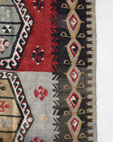 Vintage kilim rug in living room setting, bright colors, wild shaman, soft rug, bold color, Portland, Oregon, rug store, rug shop, local shop, vintage rug, modern kilim, warm colors, antique kilim rug