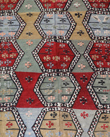 Vintage kilim rug in living room setting, bright colors, wild shaman, soft rug, bold color, Portland, Oregon, rug store, rug shop, local shop, vintage rug, modern kilim, warm colors, antique kilim rug