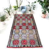 Vintage kilim rug in living room setting, bright colors, wild shaman, soft rug, bold color, Portland, Oregon, rug store, rug shop, local shop, vintage rug, modern kilim, warm colors, antique kilim rug