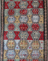 Vintage kilim rug in living room setting, bright colors, wild shaman, soft rug, bold color, Portland, Oregon, rug store, rug shop, local shop, vintage rug, modern kilim, warm colors, antique kilim rug