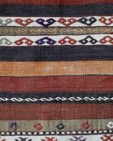 Vintage kilim rug in living room setting, bright colors, wild shaman, soft rug, bold color, Portland, Oregon, rug store, rug shop, local shop, vintage rug, modern kilim, warm colors