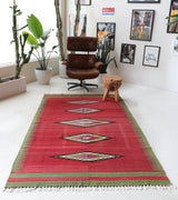 Vintage kilim rug in living room setting, bright colors, wild shaman, soft rug, bold color, Portland, Oregon, rug store, rug shop, local shop, vintage rug, modern kilim, warm colors