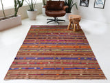 Vintage kilim rug in living room setting, bright colors, wild shaman, soft rug, bold color, Portland, Oregon, rug store, rug shop, local shop, vintage rug, modern kilim, warm colors