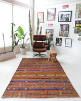 Vintage kilim rug in living room setting, bright colors, wild shaman, soft rug, bold color, Portland, Oregon, rug store, rug shop, local shop, vintage rug, modern kilim, warm colors