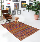 Vintage kilim rug in living room setting, bright colors, wild shaman, soft rug, bold color, Portland, Oregon, rug store, rug shop, local shop, vintage rug, modern kilim, warm colors