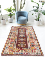 Vintage Turkish rug in living room setting, old rug, antique rug, pastel colors, faded colors, Turkish rug, vintage rug, soft rug, Portland, Oregon, rug store, rug shop, local shop