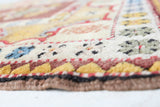 Vintage Turkish rug in living room setting, old rug, antique rug, pastel colors, faded colors, Turkish rug, vintage rug, soft rug, Portland, Oregon, rug store, rug shop, local shop