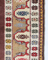 Vintage Turkish rug in living room setting, old rug, antique rug, pastel colors, faded colors, Turkish rug, vintage rug, soft rug, Portland, Oregon, rug store, rug shop, local shop