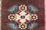 Vintage Turkish rug in living room setting, old rug, antique rug, pastel colors, faded colors, Turkish rug, vintage rug, soft rug, Portland, Oregon, rug store, rug shop, local shop