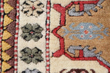 Vintage Turkish rug in living room setting, old rug, antique rug, pastel colors, faded colors, Turkish rug, vintage rug, soft rug, Portland, Oregon, rug store, rug shop, local shop