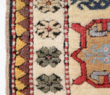 Vintage Turkish rug in living room setting, old rug, antique rug, pastel colors, faded colors, Turkish rug, vintage rug, soft rug, Portland, Oregon, rug store, rug shop, local shop
