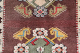 Vintage Turkish rug in living room setting, old rug, antique rug, pastel colors, faded colors, Turkish rug, vintage rug, soft rug, Portland, Oregon, rug store, rug shop, local shop