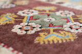 Vintage Turkish rug in living room setting, old rug, antique rug, pastel colors, faded colors, Turkish rug, vintage rug, soft rug, Portland, Oregon, rug store, rug shop, local shop