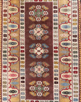 Vintage Turkish rug in living room setting, old rug, antique rug, pastel colors, faded colors, Turkish rug, vintage rug, soft rug, Portland, Oregon, rug store, rug shop, local shop