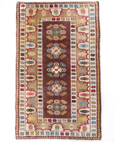 Vintage Turkish rug in living room setting, old rug, antique rug, pastel colors, faded colors, Turkish rug, vintage rug, soft rug, Portland, Oregon, rug store, rug shop, local shop