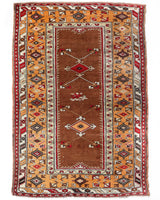 Vintage Turkish rug in a living room setting, pile rug, Turkish rug, vintage rug, portland, rug shop, bright colors, wild shaman, soft rug, bold color, Portland, Oregon, rug store, rug shop, local shop, antique rug