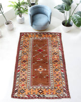 Vintage Turkish rug in a living room setting, pile rug, Turkish rug, vintage rug, portland, rug shop, bright colors, wild shaman, soft rug, bold color, Portland, Oregon, rug store, rug shop, local shop, antique rug