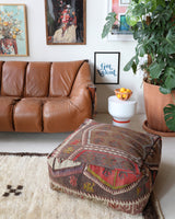 Floor pouf in a living room setting, pillow, turkish pillow, kilim pillow, home decor, decorative pillow, sham, rug pillow, decor, home decor, pouf, floor cushion, cushion, Portland, rugshop, Oregon, Wild Shaman, ottoman