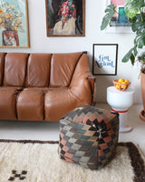 Floor pouf in a living room setting, pillow, turkish pillow, kilim pillow, home decor, decorative pillow, sham, rug pillow, decor, home decor, pouf, floor cushion, cushion, Portland, rugshop, Oregon, Wild Shaman, ottoman