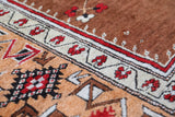Vintage Turkish rug in a living room setting, pile rug, Turkish rug, vintage rug, portland, rug shop, bright colors, wild shaman, soft rug, bold color, Portland, Oregon, rug store, rug shop, local shop, antique rug