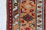 Vintage Turkish rug in a living room setting, pile rug, Turkish rug, vintage rug, portland, rug shop, bright colors, wild shaman, soft rug, bold color, Portland, Oregon, rug store, rug shop, local shop, antique rug