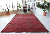 Antique Turkmen rug in a living room setting, pile rug, Turkish rug, vintage rug, portland, rug shop, bright colors, wild shaman, soft rug, bold color, Portland, Oregon, rug store, rug shop, local shop, antique rug