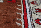Vintage Turkish rug in a living room setting, pile rug, Turkish rug, vintage rug, portland, rug shop, bright colors, wild shaman, soft rug, bold color, Portland, Oregon, rug store, rug shop, local shop, antique rug