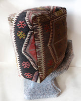 Floor pouf in a living room setting, pillow, turkish pillow, kilim pillow, home decor, decorative pillow, sham, rug pillow, decor, home decor, pouf, floor cushion, cushion, Portland, rugshop, Oregon, Wild Shaman, ottoman