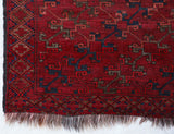 Antique Turkmen rug in a living room setting, pile rug, Turkish rug, vintage rug, portland, rug shop, bright colors, wild shaman, soft rug, bold color, Portland, Oregon, rug store, rug shop, local shop, antique rug