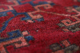 Antique Turkmen rug in a living room setting, pile rug, Turkish rug, vintage rug, portland, rug shop, bright colors, wild shaman, soft rug, bold color, Portland, Oregon, rug store, rug shop, local shop, antique rug