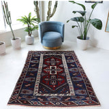 Vintage Turkish rug in a living room setting, pile rug, Turkish rug, vintage rug, portland, rug shop, bright colors, wild shaman, soft rug, bold color, Portland, Oregon, rug store, rug shop, local shop, antique rug