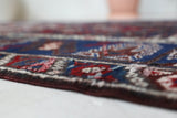 Vintage Turkish rug in a living room setting, pile rug, Turkish rug, vintage rug, portland, rug shop, bright colors, wild shaman, soft rug, bold color, Portland, Oregon, rug store, rug shop, local shop, antique rug