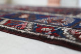 Vintage Turkish rug in a living room setting, pile rug, Turkish rug, vintage rug, portland, rug shop, bright colors, wild shaman, soft rug, bold color, Portland, Oregon, rug store, rug shop, local shop, antique rug