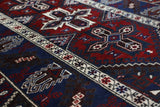 Vintage Turkish rug in a living room setting, pile rug, Turkish rug, vintage rug, portland, rug shop, bright colors, wild shaman, soft rug, bold color, Portland, Oregon, rug store, rug shop, local shop, antique rug