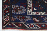 Vintage Turkish rug in a living room setting, pile rug, Turkish rug, vintage rug, portland, rug shop, bright colors, wild shaman, soft rug, bold color, Portland, Oregon, rug store, rug shop, local shop, antique rug