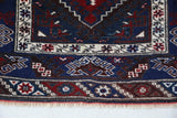 Vintage Turkish rug in a living room setting, pile rug, Turkish rug, vintage rug, portland, rug shop, bright colors, wild shaman, soft rug, bold color, Portland, Oregon, rug store, rug shop, local shop, antique rug