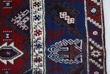 Vintage Turkish rug in a living room setting, pile rug, Turkish rug, vintage rug, portland, rug shop, bright colors, wild shaman, soft rug, bold color, Portland, Oregon, rug store, rug shop, local shop, antique rug