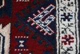 Vintage Turkish rug in a living room setting, pile rug, Turkish rug, vintage rug, portland, rug shop, bright colors, wild shaman, soft rug, bold color, Portland, Oregon, rug store, rug shop, local shop, antique rug