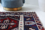 Vintage Turkish rug in a living room setting, pile rug, Turkish rug, vintage rug, portland, rug shop, bright colors, wild shaman, soft rug, bold color, Portland, Oregon, rug store, rug shop, local shop, antique rug