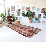 Vintage kilim rug in living room setting, bright colors, wild shaman, soft rug, bold color, Portland, Oregon, rug store, rug shop, local shop, vintage rug, modern kilim, warm colors