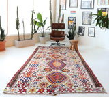 Vintage kilim rug in living room setting, bright colors, wild shaman, soft rug, bold color, Portland, Oregon, rug store, rug shop, local shop, vintage rug, modern kilim, warm colors