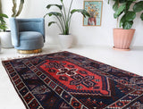 Vintage Turkish rug in a living room setting, pile rug, Turkish rug, vintage rug, portland, rug shop, bright colors, wild shaman, soft rug, bold color, Portland, Oregon, rug store, rug shop, local shop, antique rug