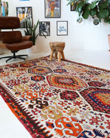 Vintage kilim rug in living room setting, bright colors, wild shaman, soft rug, bold color, Portland, Oregon, rug store, rug shop, local shop, vintage rug, modern kilim, warm colors