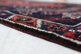 Vintage Turkish rug in a living room setting, pile rug, Turkish rug, vintage rug, portland, rug shop, bright colors, wild shaman, soft rug, bold color, Portland, Oregon, rug store, rug shop, local shop, antique rug