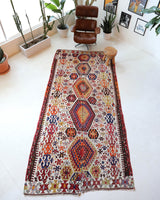 Vintage kilim rug in living room setting, bright colors, wild shaman, soft rug, bold color, Portland, Oregon, rug store, rug shop, local shop, vintage rug, modern kilim, warm colors