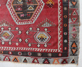 Vintage kilim rug in room decor setting, old rug, antique rug, pastel colors, faded colors, Turkish rug, vintage rug, soft rug, Portland, Oregon, rug store, rug shop, local shop, bold colors, bright colors, faded colors